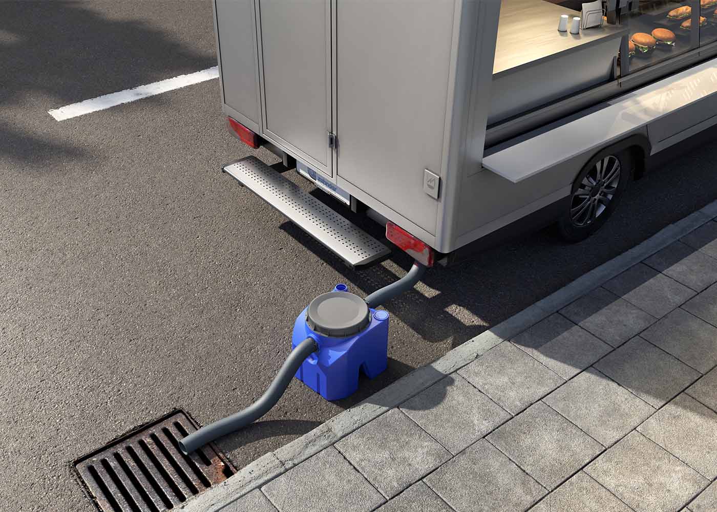 mobiler Fettabscheider hinter einem Imbisswagen